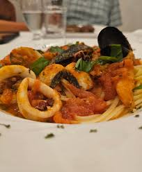 Agrigento Ristorante Italiano signature dishes Spaghetti Agrigento (Seafood Pasta)Veal PizzaiolaLasagna